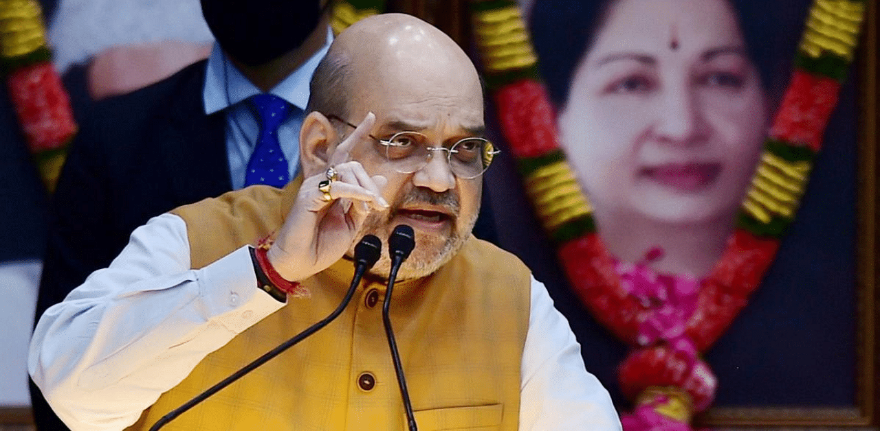 Union Home Minister Amit Shah addresses during programme organised to declare open the Thervoy Kandigai Reservoir (Chennai's fifth Reservoir) and lay the foundation stone for several infrastructure projects across the state of Tamil Nadu, in Chennai. Credit: PTI Photo
