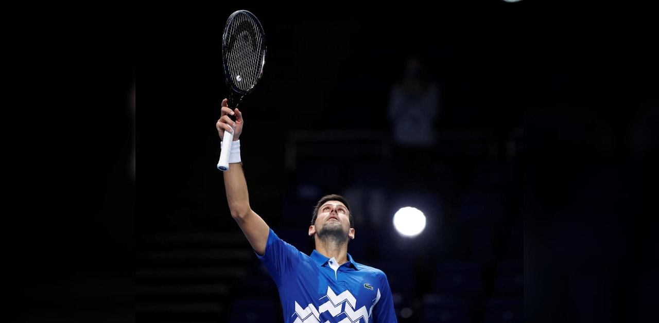 Serbia's Novak Djokovic celebrates winning his group stage match against Germany's Alexander Zverev. Credit: Reuters Photo