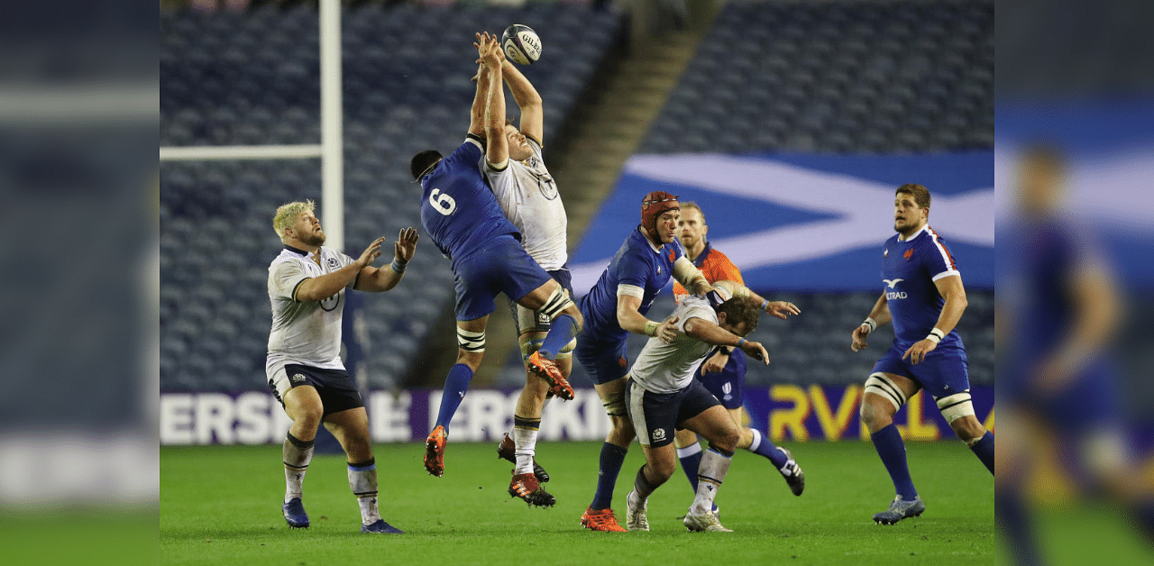 Scotland's Johnny Gray in action with France's Dylan Cretin. Credit: Reuters Photo