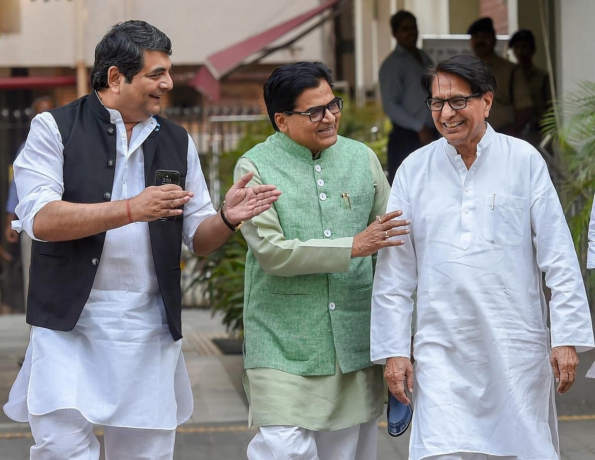 Congress leader RPN Singh (L), Samajwadi Party leader Ramgopal Yadav (C) and Rashtriya Lok Dal chief Ajit Singh come out after a meeting with the Election Commission over the reports of malfunctioning of the EVMs, at Nirvachan Sadan, in New Delhi on Monday. PTI