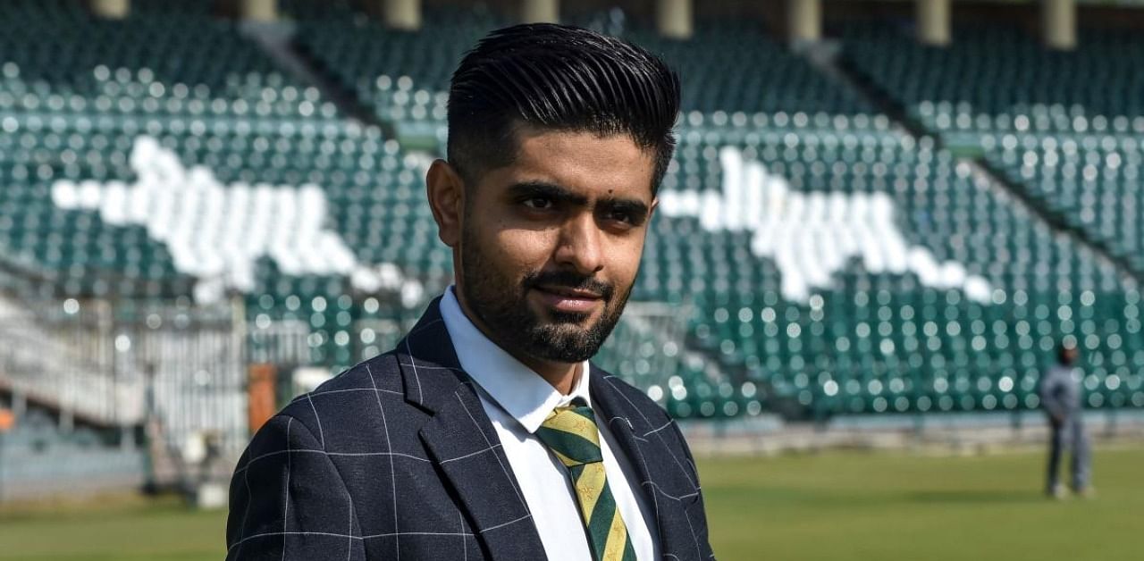 Pakistan's cricket team captain Babar Azam poses for photographs after a media briefing in Lahore on November 20, 2020, ahead of the team tour in New Zealand. Credit: AFP Photo