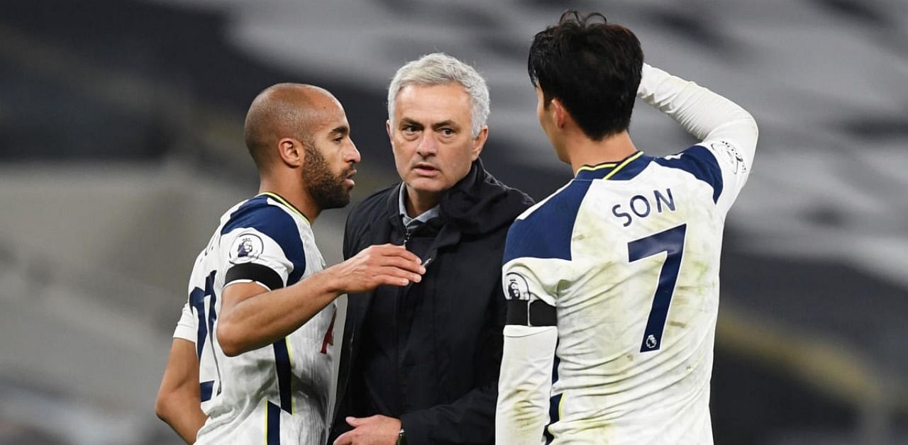 Tottenham Hotspur manager Jose Mourinho celebrates with Lucas Moura and Son Heung-min after the match. Credit: Reuters.