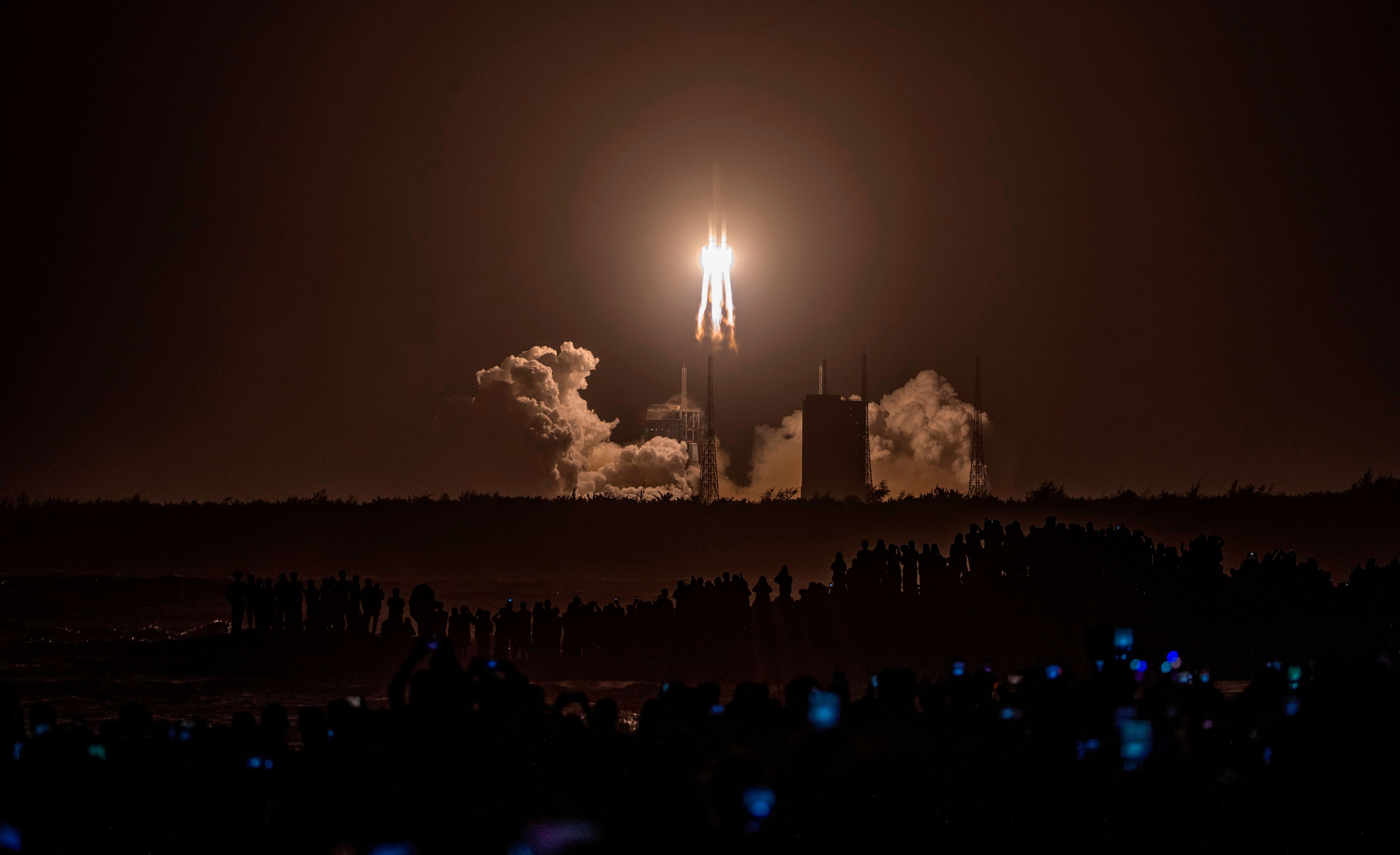 A Long March 5 rocket carrying China's Chang'e-5 lunar probe launches from the Wenchang Space Center on China's southern Hainan Island. Credit: AFP Photo