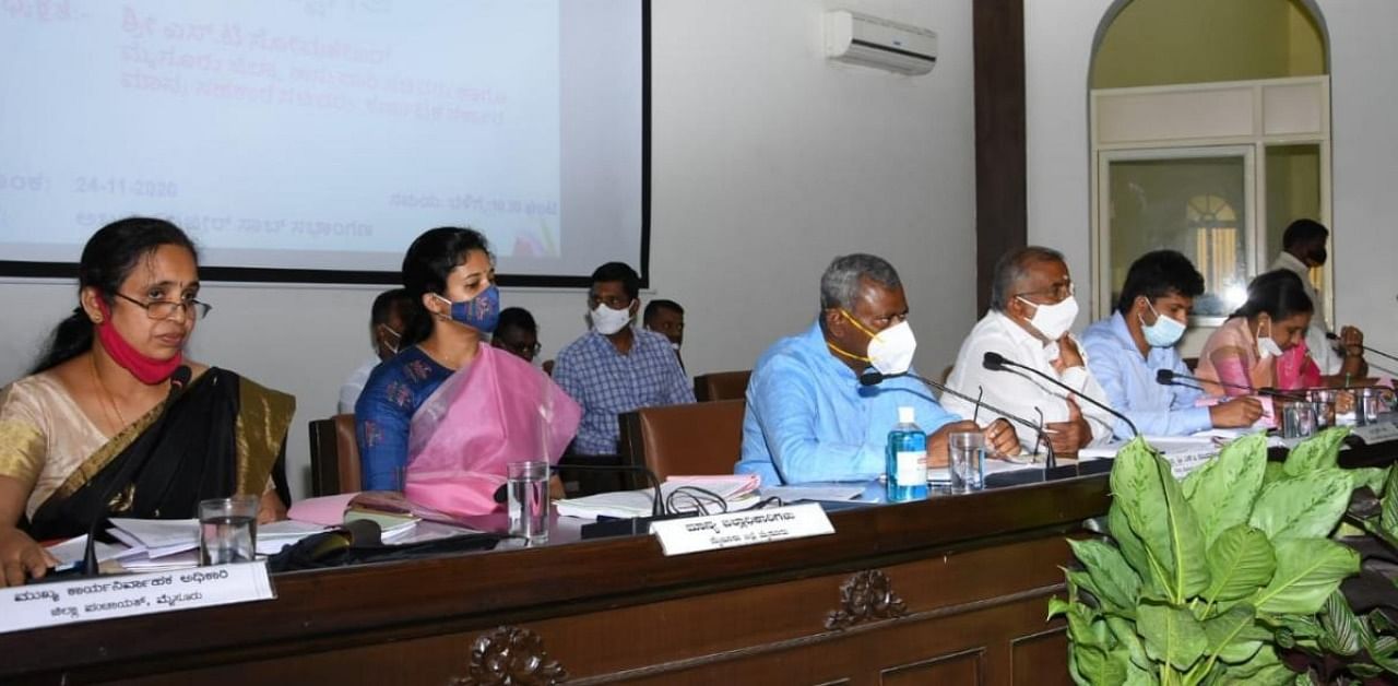 Cooperation and District In-charge Minister S T Somashekar speaks during the progress review meeting of Karnataka Development Programme (KDP) at Zilla Panchayat in Mysuru on Tuesday. Credit: DH.