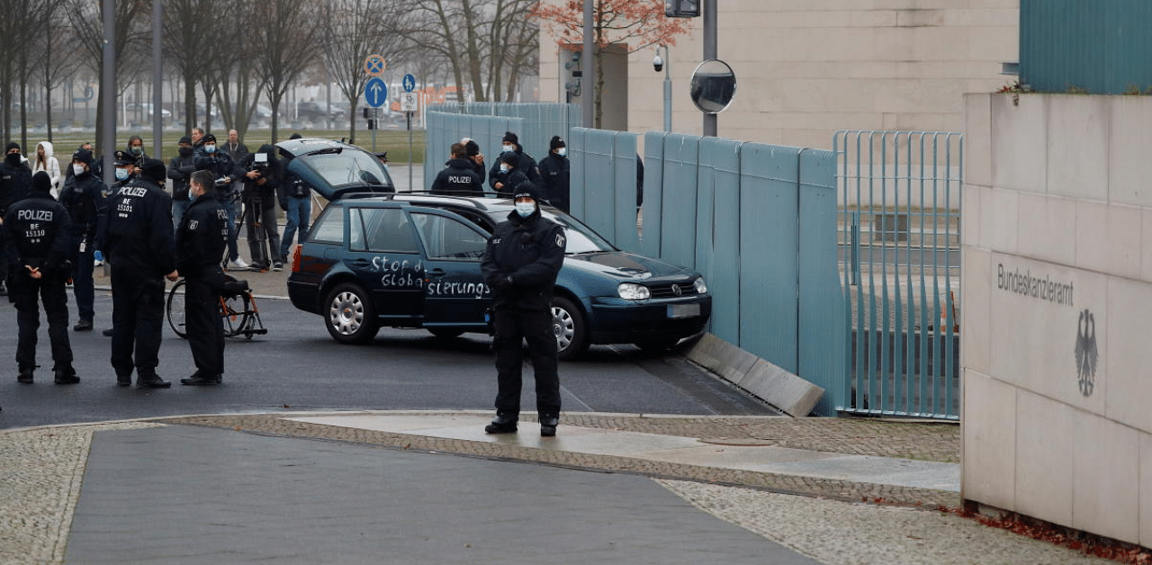 Police secures the area after a man crashed with his car into the gate of the main entrance of the chancellery in Berlin, the office of German Chancellor Angela Merkel in Berlin, Germany. Credit: Reuters Photo
