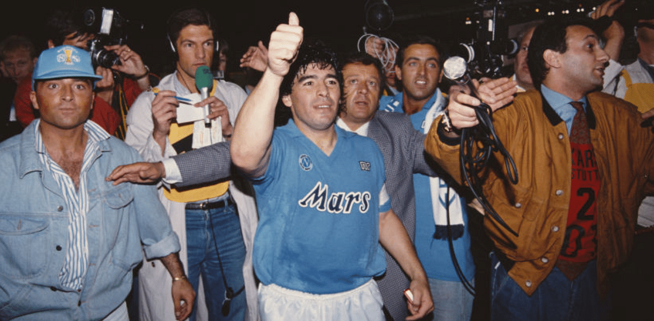 Napoli captain Diego Maradona surrounded by media after the 1989 UEFA Cup Final second leg between VFB Stuttgart and S.S.C Napoli at Neckarstadion on May 17, 1989 in Stuttgart, West Germany. Credit: Getty Images