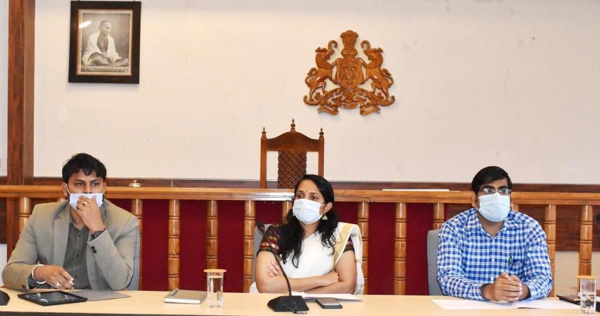 Deputy Commissioner Annies Kanmani Joy conducts a meeting of the District Vigilance and Monitoring Committee Against Atrocities on SC/ST Communities, at the DC’s office on Wednesday. Credit: DH.