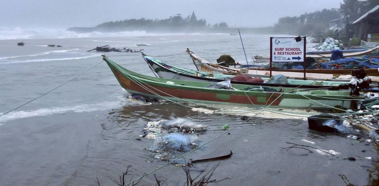 Boats anchored at a coastal area before the landfall of Cyclone Nivar. Credit: PTI.