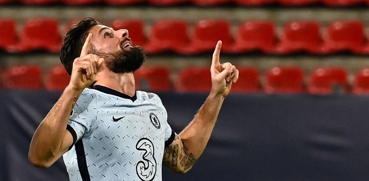 Chelsea's French forward Olivier Giroud celebrates after scoring his team's second goal during the UEFA Champions League Group E football match between Stade Rennais FC and Chelsea FC at the Roazhon Park stadium. Credit: AFP.