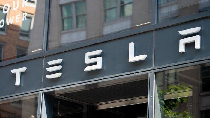 Tesla is riding a wave of enthusiasm from investors who see the electric car maker's future as bright. Credit: AFP
