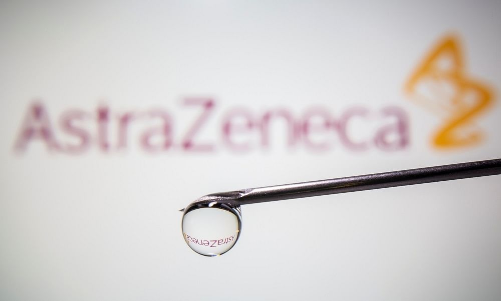 AstraZeneca's logo is reflected in a drop on a syringe needle in this illustration. Credit: Reuters Photo