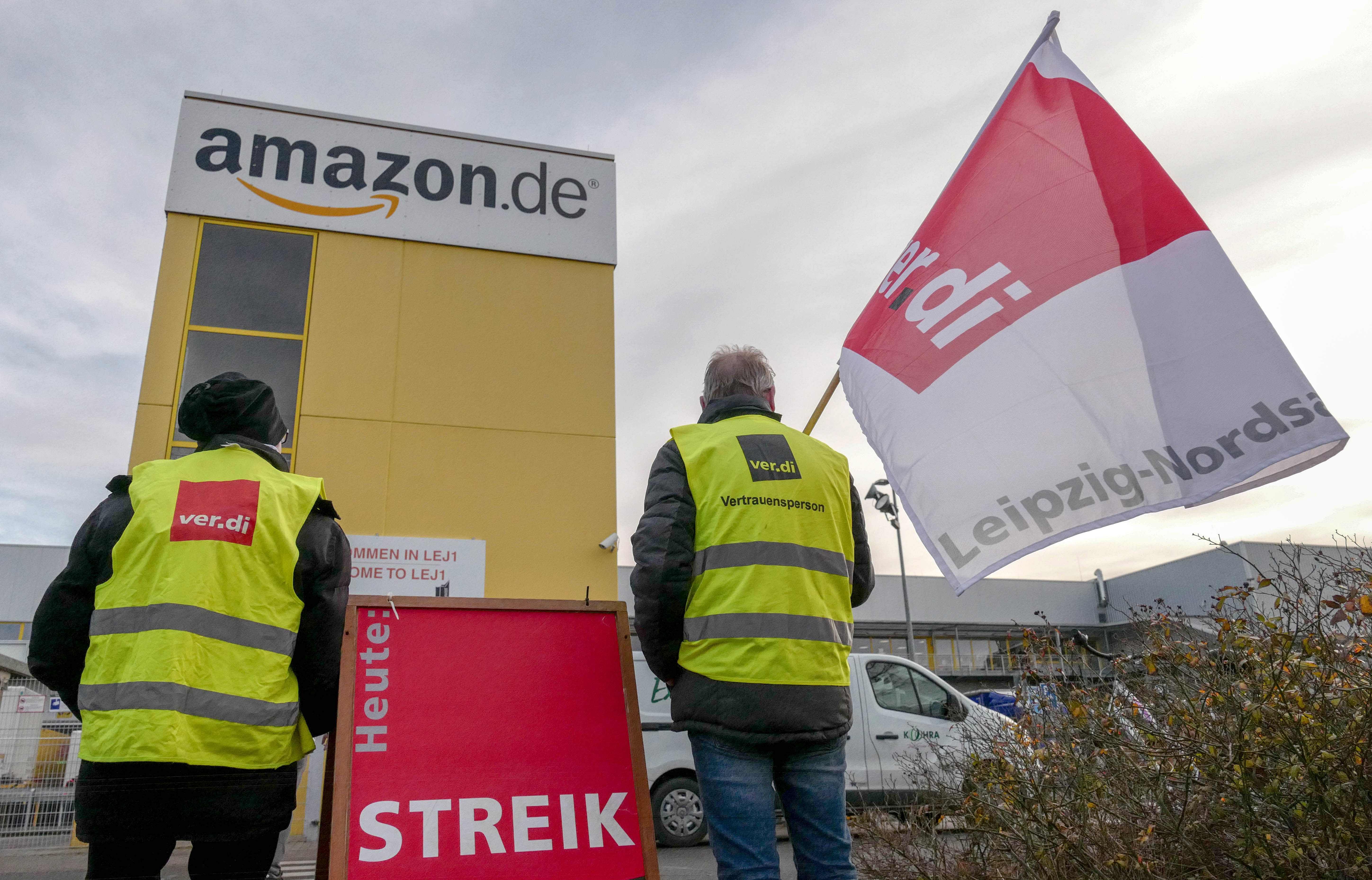 German union verdi on strike stand in front of the site of Amazon fulfillment center in Leipzig, eastern Germany. Credit: AFP Photo