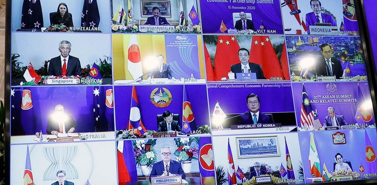 ASEAN leaders are seen on a screen as they attend the 4th Regional Comprehensive Economic Partnership Summit as part of the 37th ASEAN Summit in Hanoi. Credit: Reuters.