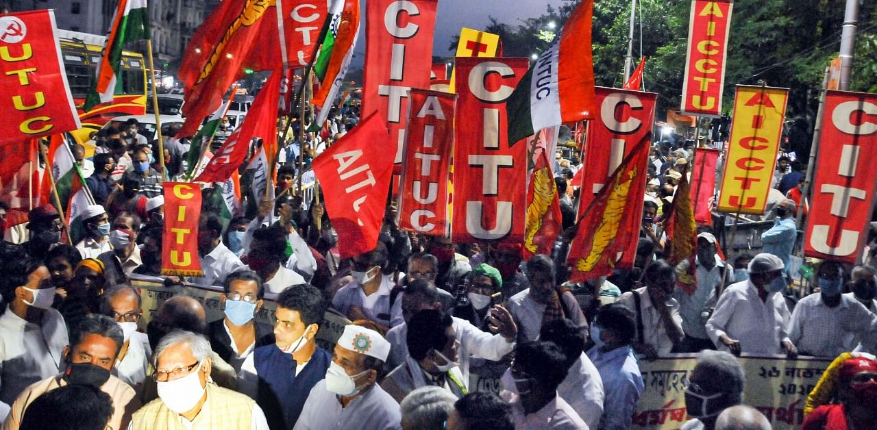 Centre of Indian Trade Unions (CITU) members participate in a rally to support 'Bharat Bandh'. Credit: PTI Photo