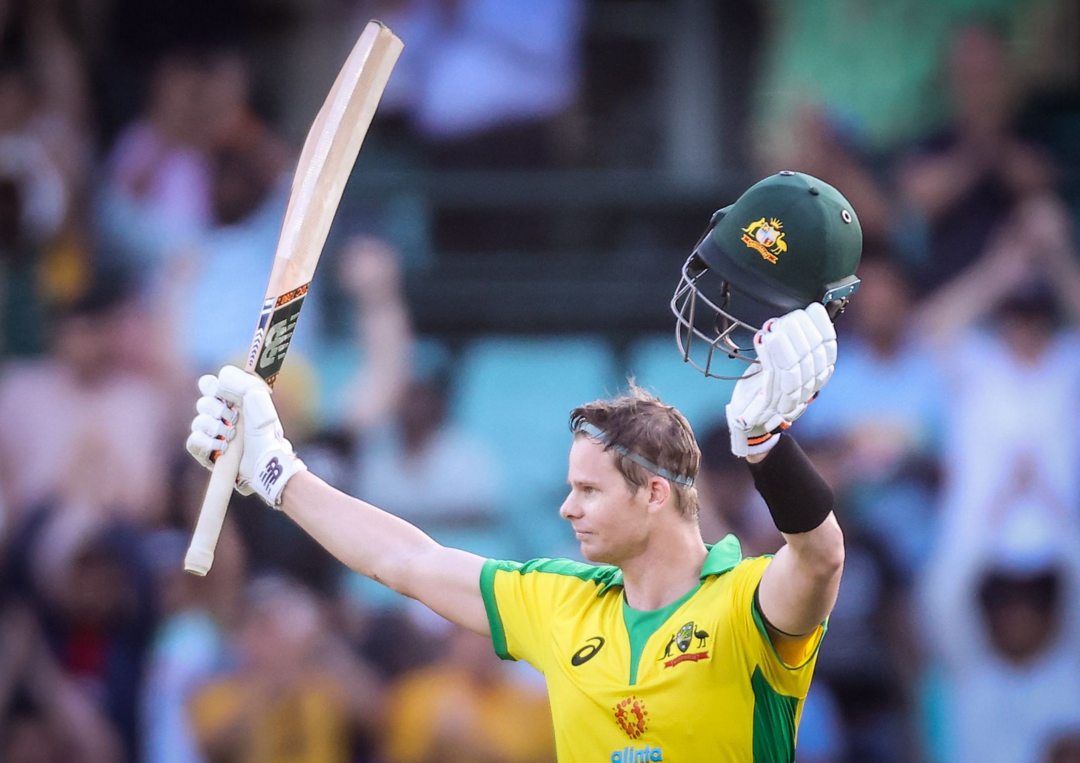 Australia’s Steve Smith celebrates reaching his century during the one-day international cricket match against India. Credit: AFP Photo