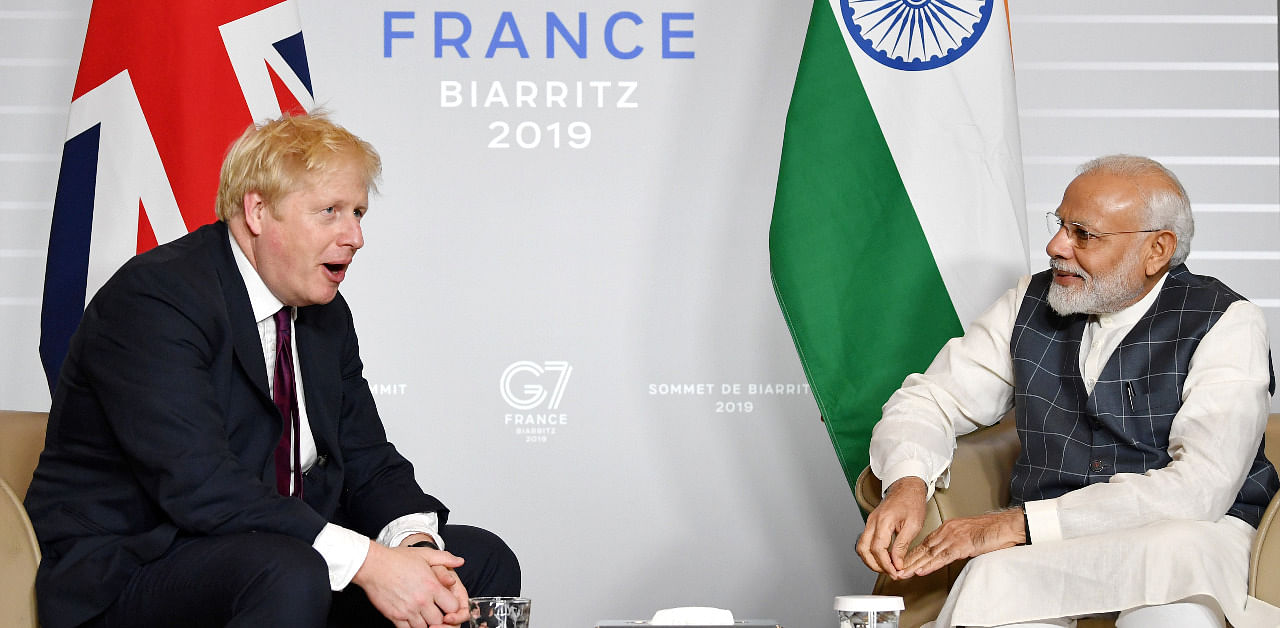 Britain's Prime Minister Boris Johnson meets Indian Prime Minister Narendra Modi at a bilateral meeting during the G7 summit in Biarritz, France. Credit: Reuters File Photo