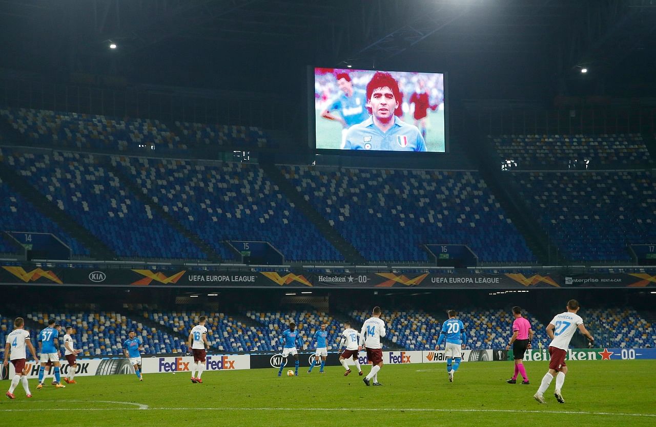 General view as an image of Diego Maradona is displayed on the big screen during the match. Credit: Reuters Photo