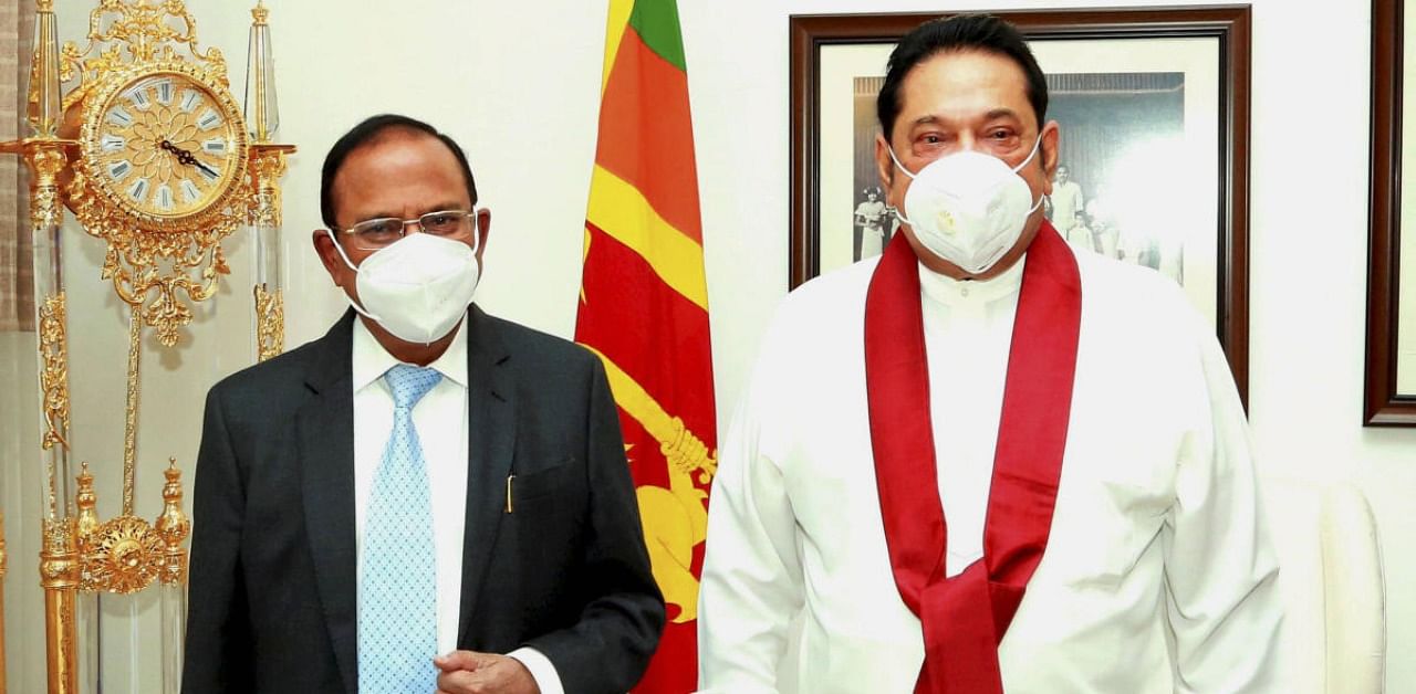 NSA Ajit Doval with Sri Lankan Prime Minister Mahinda Rajapaksa, during his visit to attend trilateral maritime dialogue among India, Sri Lanka and the Maldives. Credit: PTI Photo/Twitter