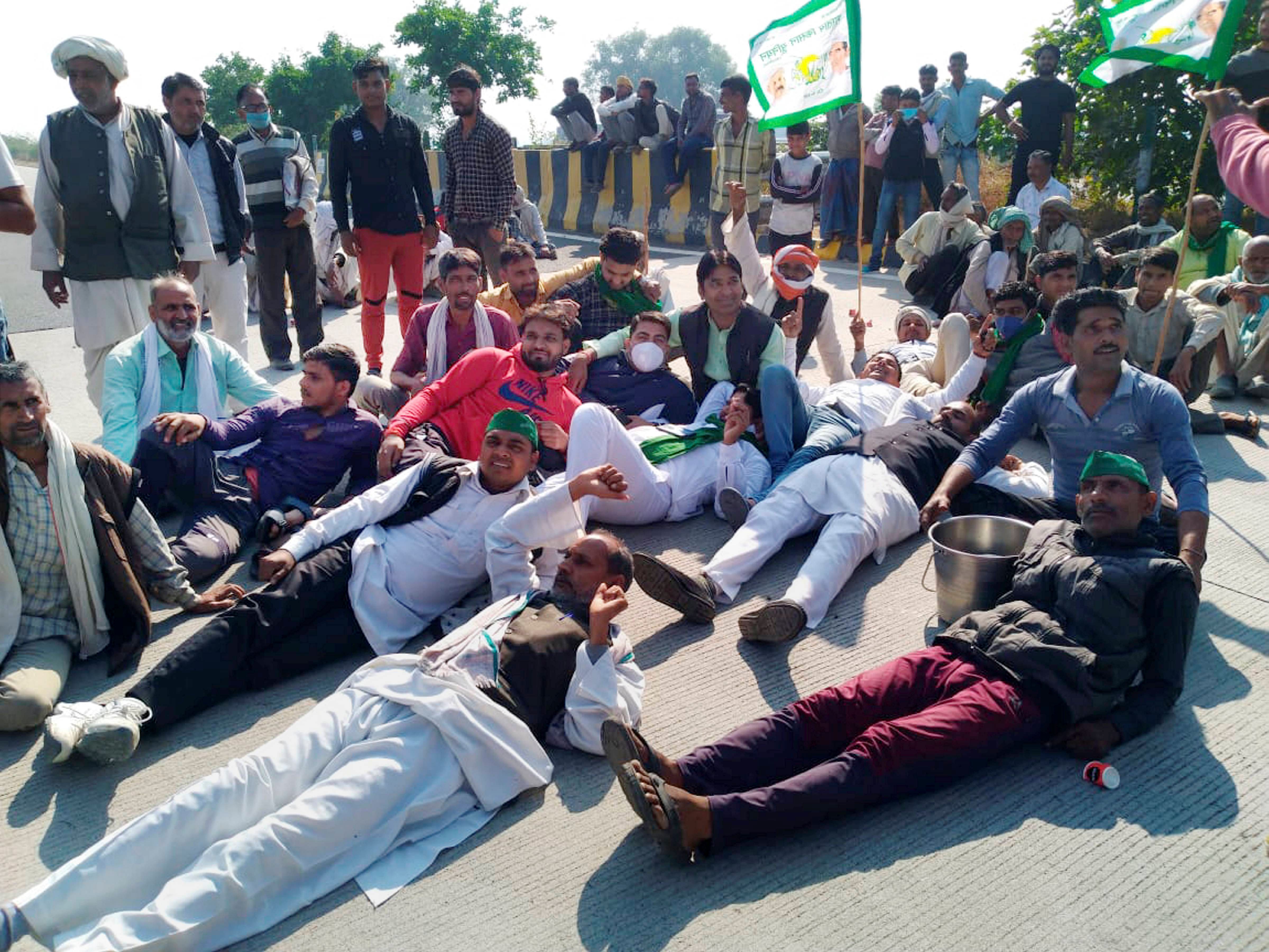 Farmers stage sit-in protests. Credit: PTI Photo