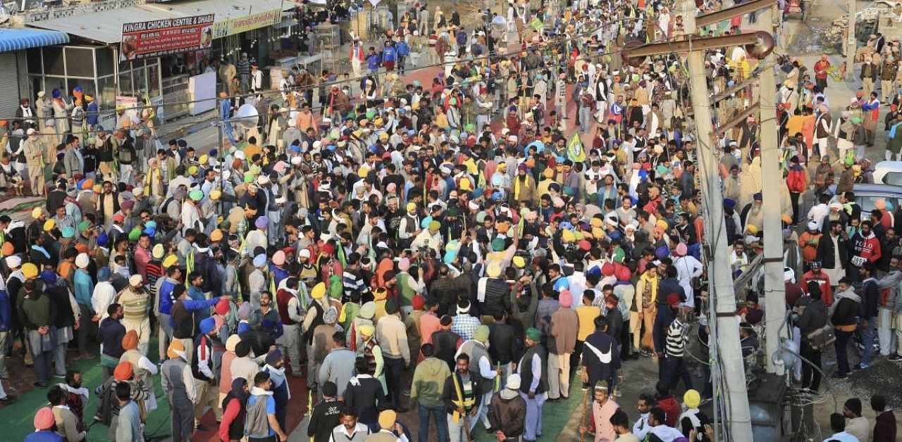 Farmers gather at the Punjab-Haryana border in Sirsa district as they participate in the 'Delhi Chalo' protest march against the farm reform laws on Thursday, November 26, 2020. Credit: PTI.