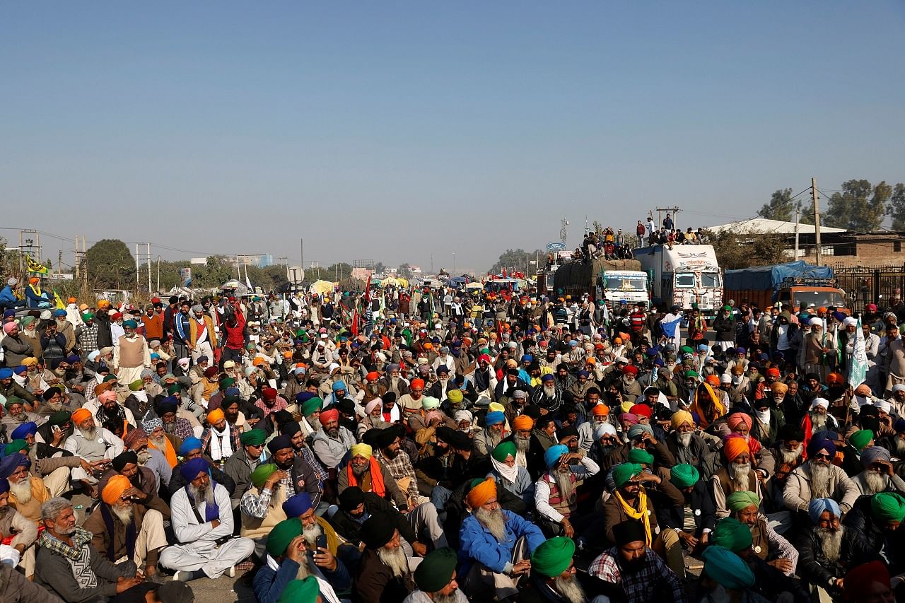 Farmers attend a protest against the newly passed farm bills at Singhu border near Delhi. Credit: Reuters Photo