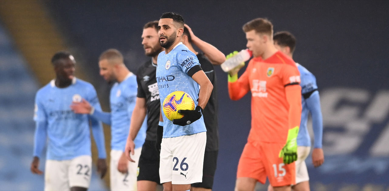 Manchester City's Riyad Mahrez celebrates his hat-trick with the match ball after the match. Credit: Reuters Photo