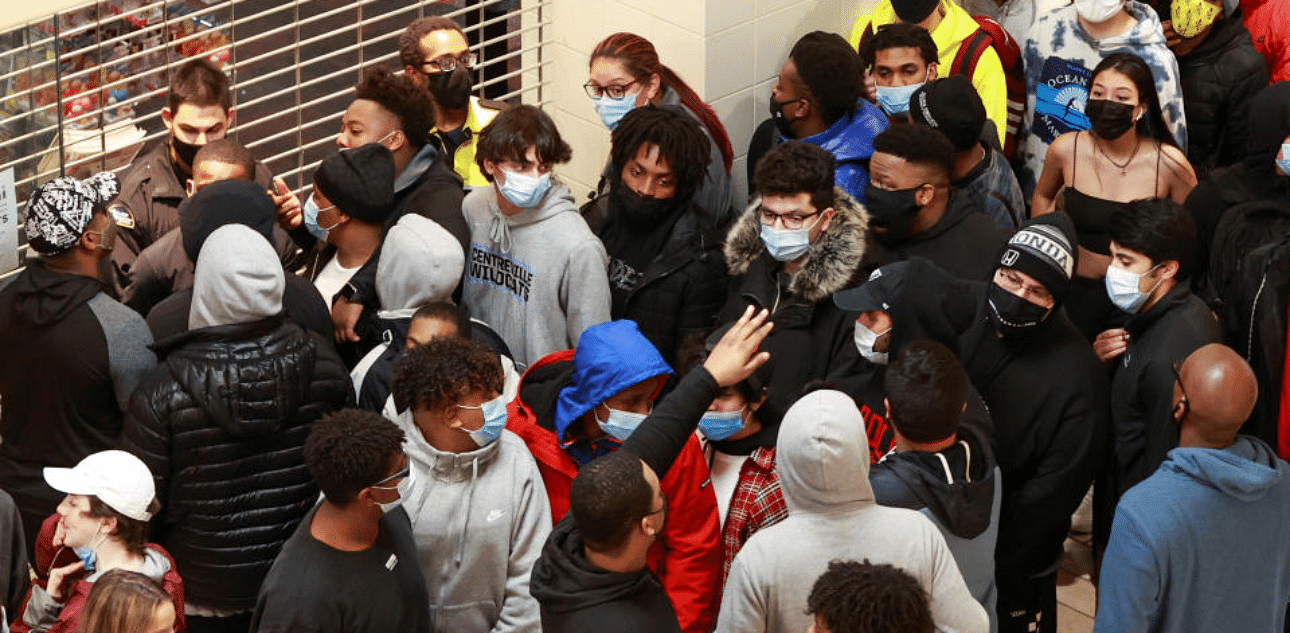 Shoppers wait for a computer games store to open on Black Friday, at the Tysons Corner Center, in Tysons, Virginia, U.S., November 27, 2020. Credit: Reuters Photo