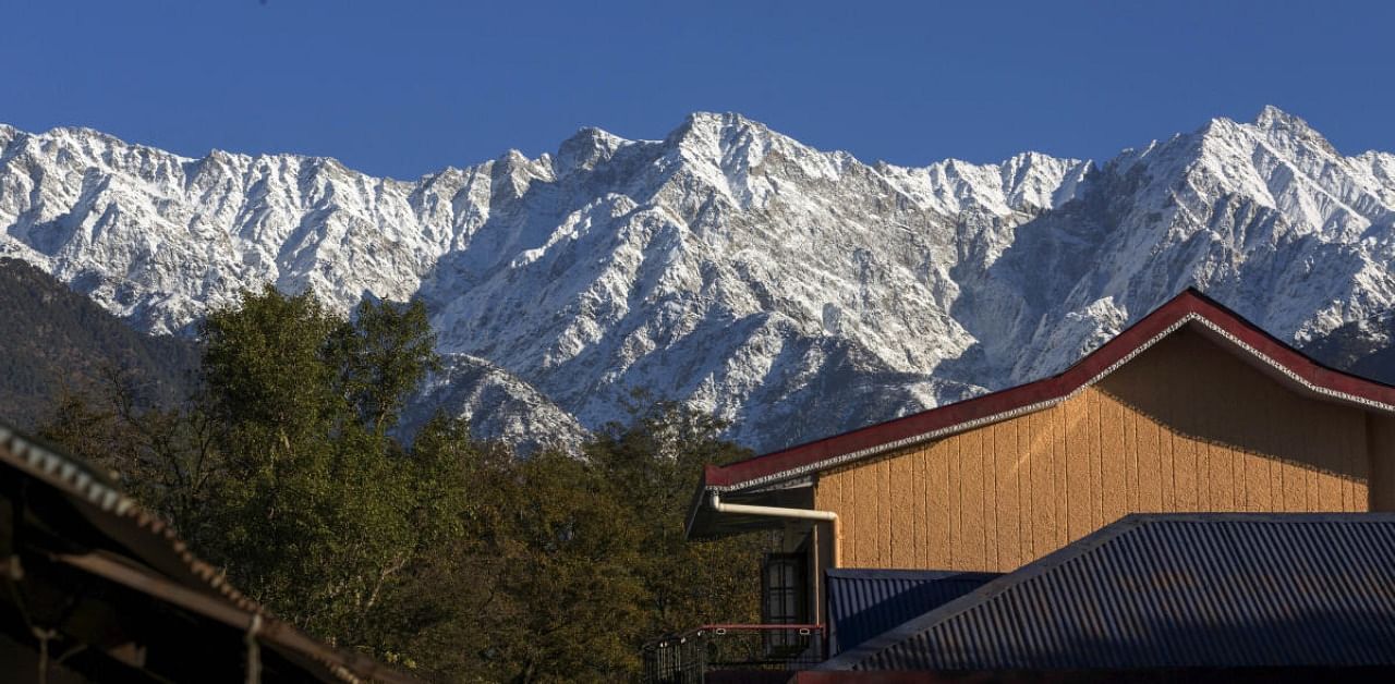 Dhauladhar Range covered in snow after it received fresh snowfall, in Palampur. Credit: PTI Photo