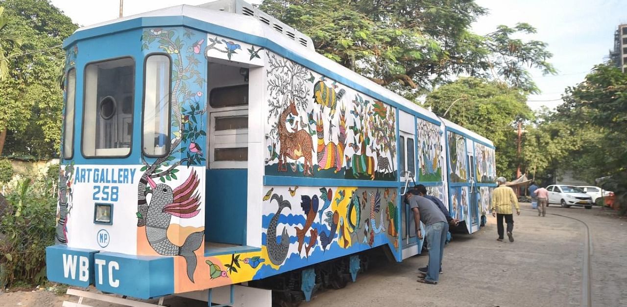View of a tram modified into a mobile art gallery, where work by various artists will be displayed as it runs across the city, in Kolkata. Credit: PTI Photo