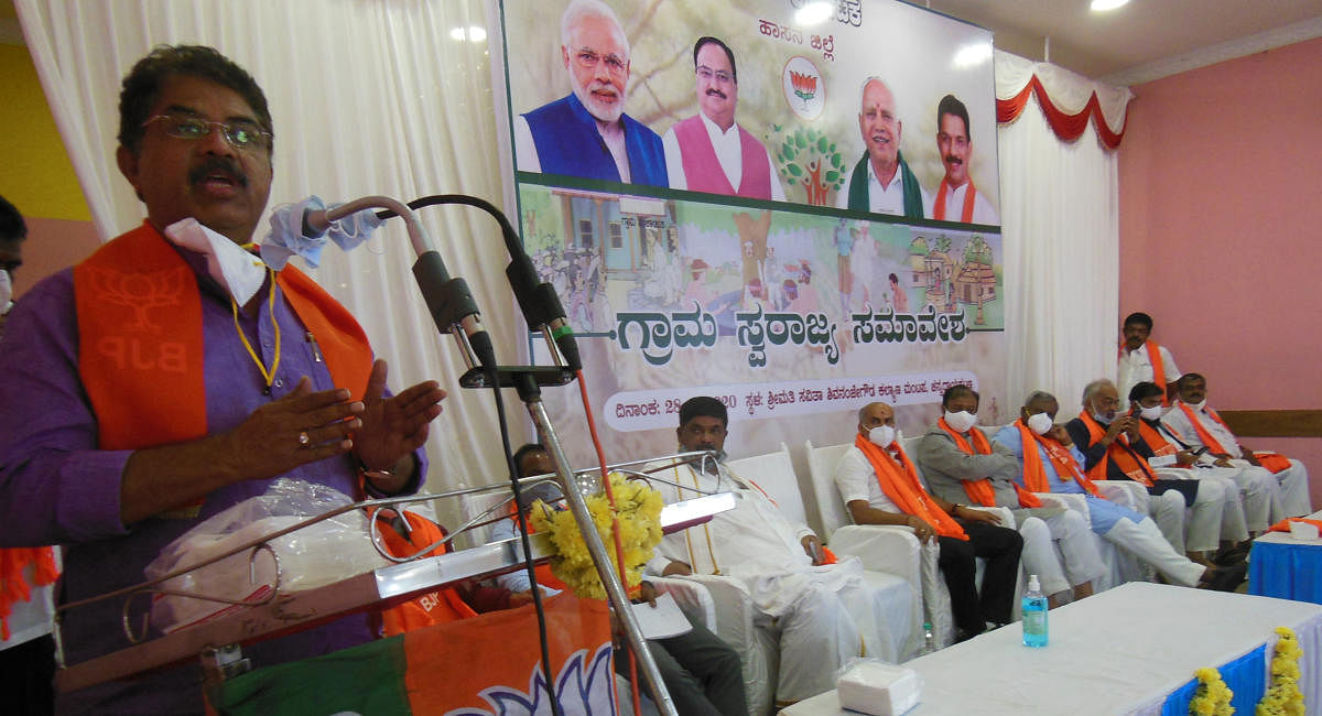 Revenue Minister R Ashoka addresses BJP workers at ‘Grama Swaraj’ convention, at Channarayapatna in Hassan district on Saturday.