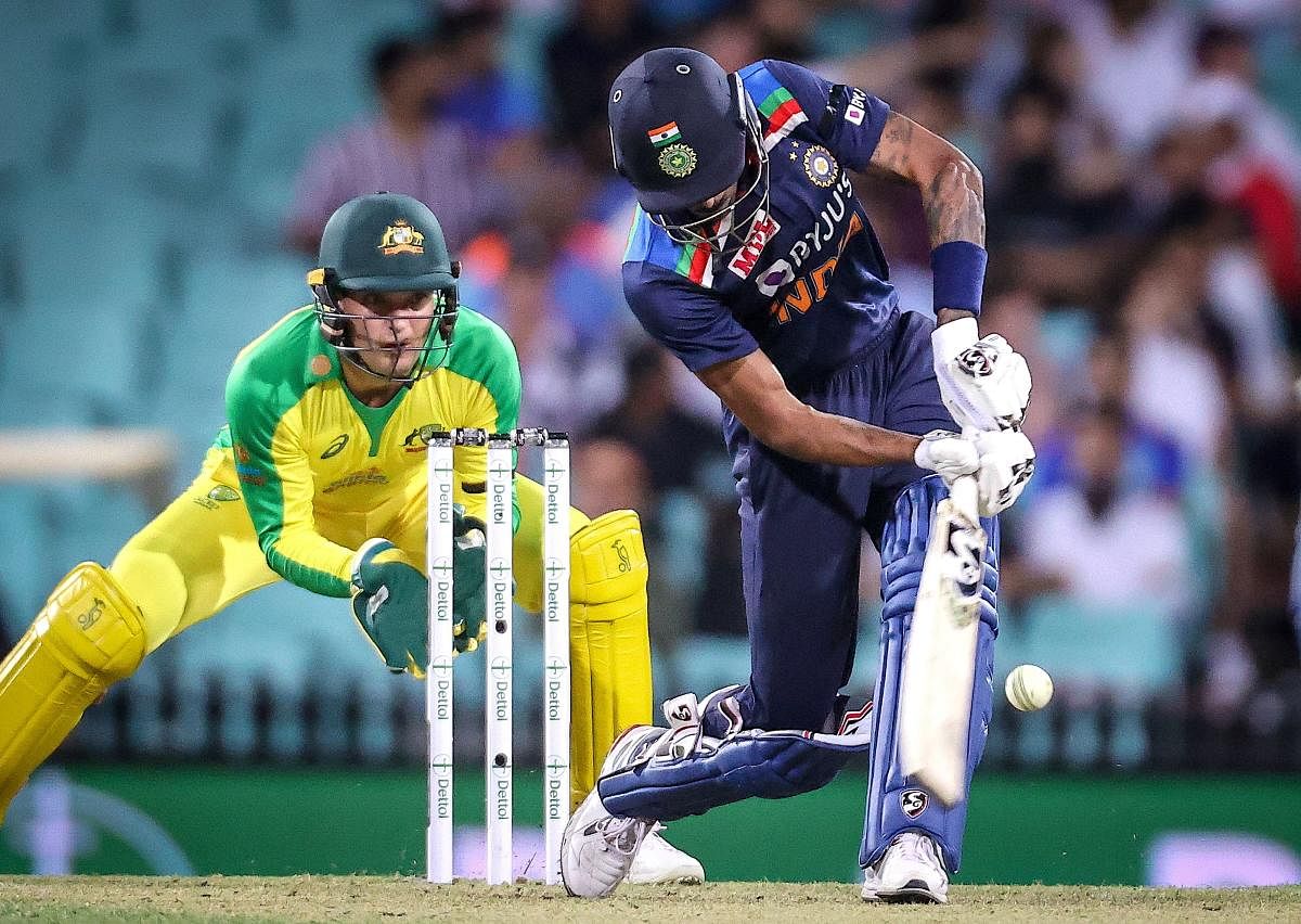 Hardik Pandya hits a six during India's one-day international cricket match against Australia at the Sydney Cricket Ground (SCG) in Sydney. Credit: AFP