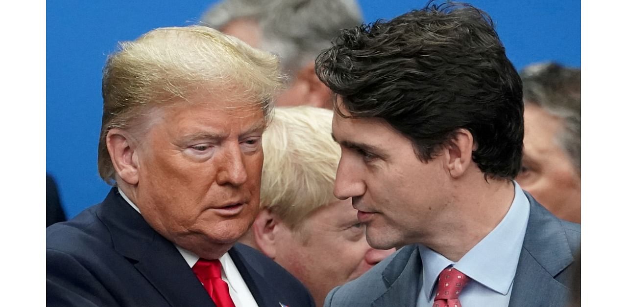 US President Donald Trump talks with Canada's Prime Minister Justin Trudeau. Credit: Reuters Photo