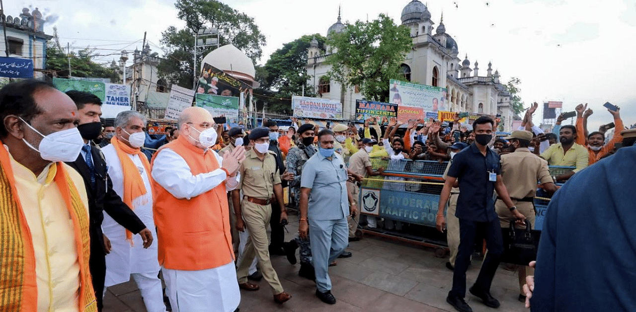 Home Minister Amit Shah on his way to visit Bhagyalakshmi Ammavari Temple, in Hyderabad. Credit: PTI Photo