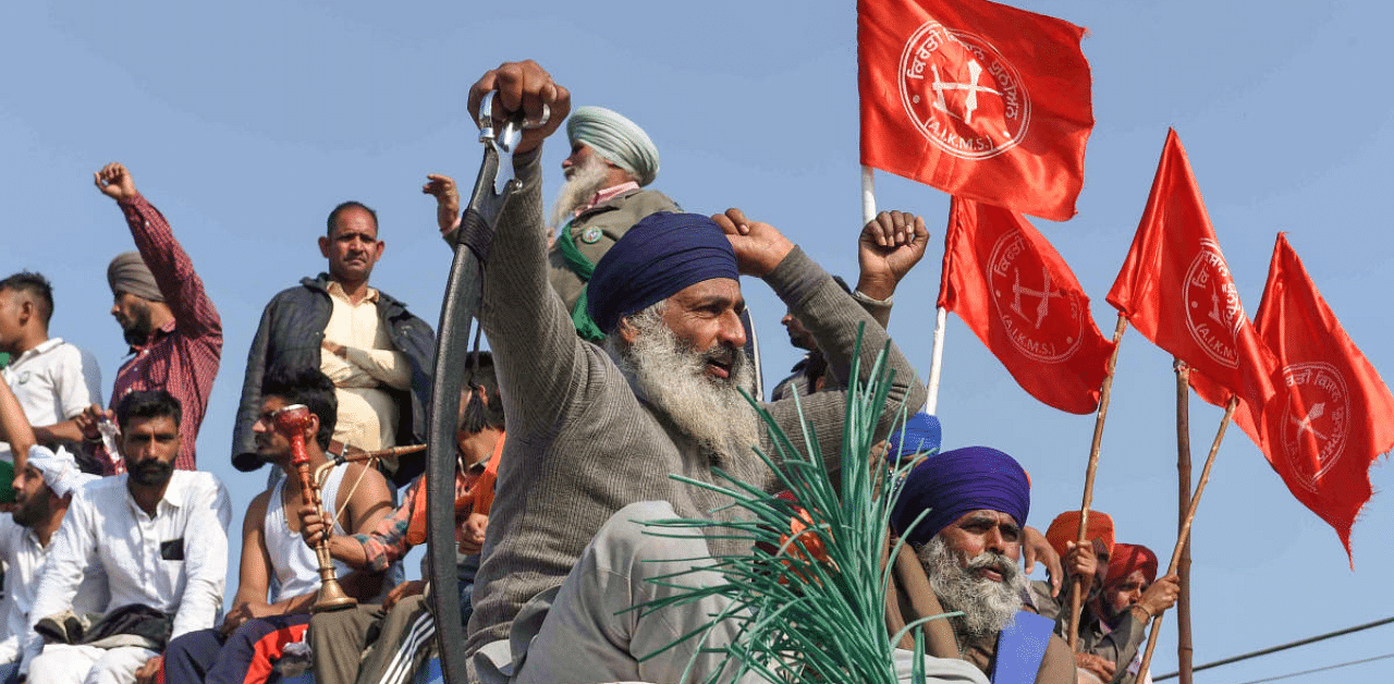 Farmers protest at Singhu border during their 'Delhi Chalo' march against the Centre's new farm laws, in New Delhi. Credit: PTI Photo