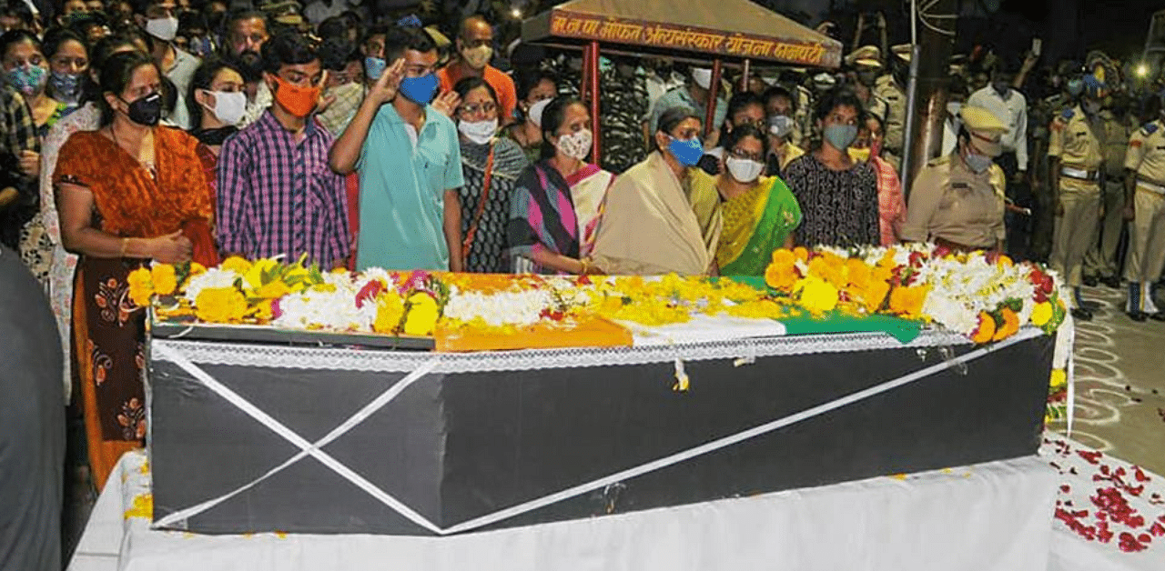  Family members and security personnel pay tribute to the mortal remains of CRPF jawan Nitin Bhalerao, who was martyred during a maoist attack in Chhattisgarh, in Nashik, Sunday, Nov. 29, 2020. Credit: PTI Photo