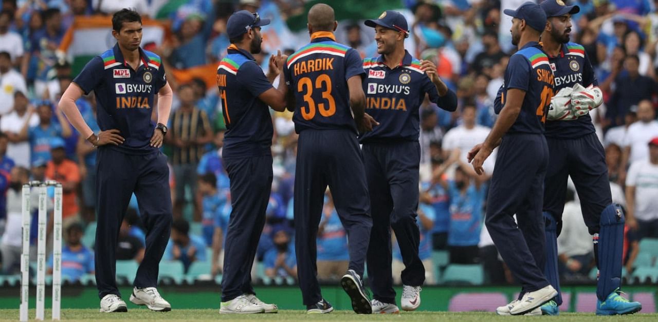Hardik Pandya celebrates the wicket of Australia's Steven Smith with teammates. Credit: Reuters.