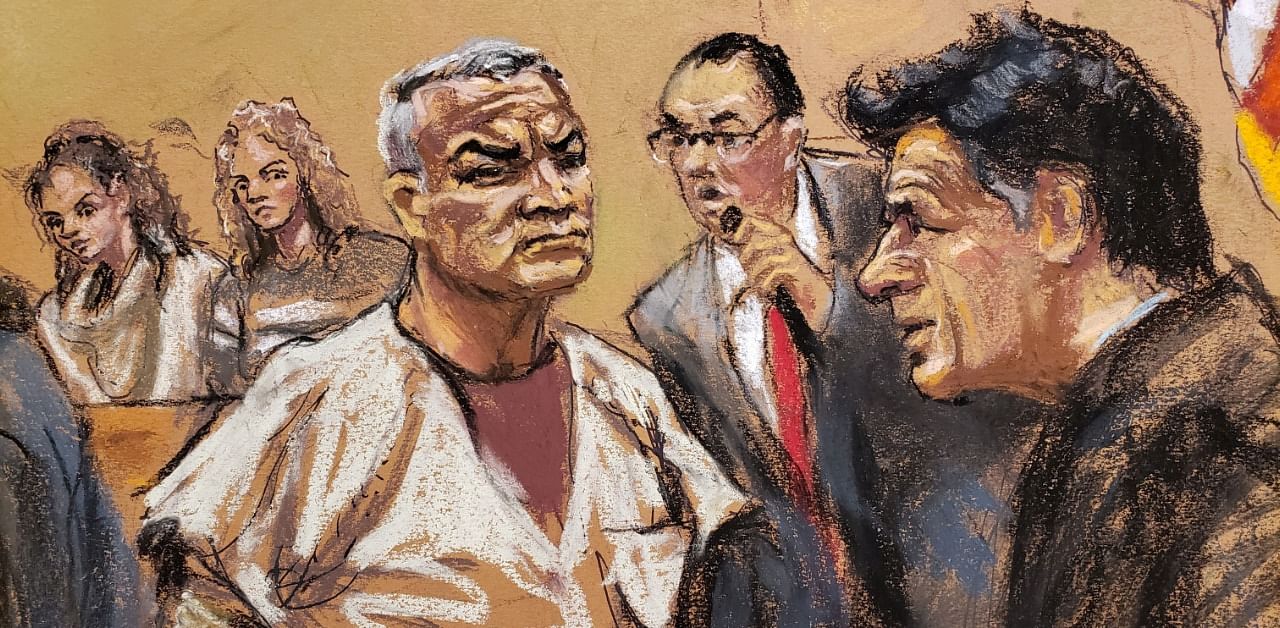 Former Mexican security secretary Genaro Garcia Luna is watched by his wife and daughter as he appears Judge Robert Levy in Brooklyn federal court in New York, US, February 28, 2020 in this courtroom sketch. Credit: Reuters Photo
