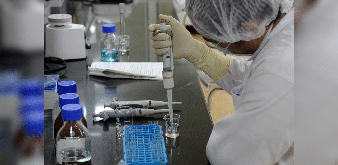  A research scientist works inside a laboratory of India's Serum Institute, the world's largest maker of vaccines, which is working on vaccines against the coronavirus disease  in Pune, India. Credit: Reuters File Photo