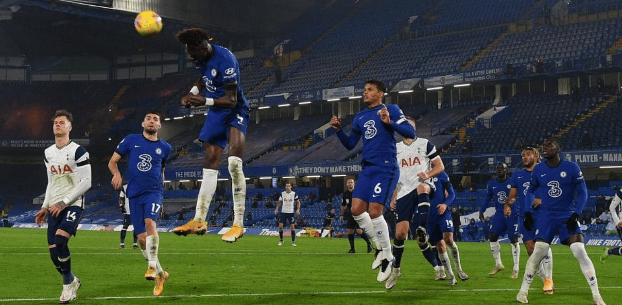 Chelsea's English striker Tammy Abraham (3L) jumps while defending a corner during the English Premier League football match between Chelsea and Tottenham Hotspur at Stamford Bridge in London on November 29, 2020.  Credit: AFP Photo