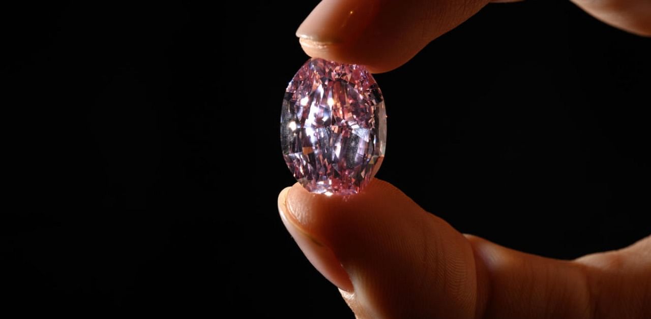 “The Spirit of the Rose” a rare 14.83 carats vivid purple-pink diamond. Credit: AFP Photo