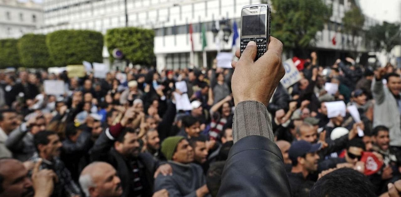 Social media and smartphones briefly gave youthful Arab Spring protesters a technological edge that allowed them to topple ageing dictatorships. Credit: AFP Photo