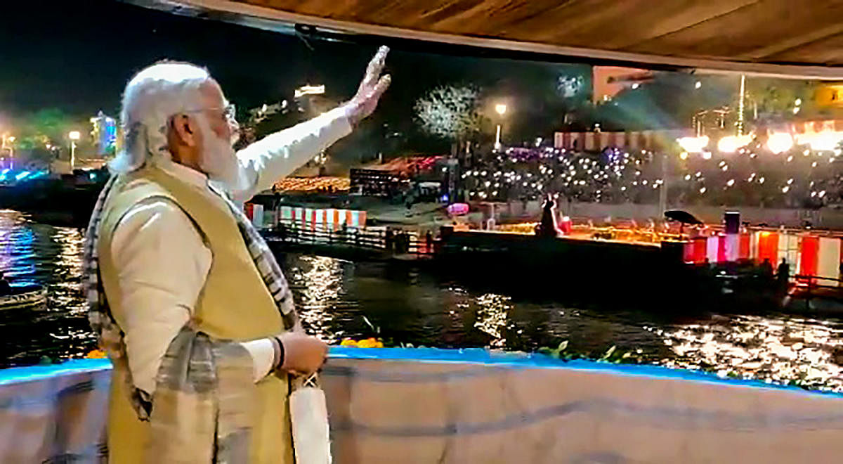 Prime Minister Narendra Modi watches the light and sound show during Dev Deepawali festival, in Varanasi. Credit: PTI