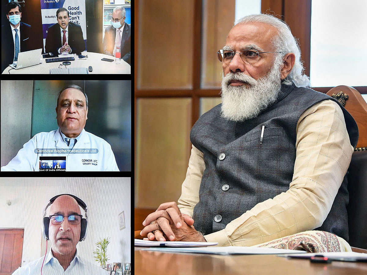 Prime Minister Narendra Modi holds virtual meetings with three teams working on developing & manufacturing vaccine for Covid-19, in New Delhi. Credit: PTI.
