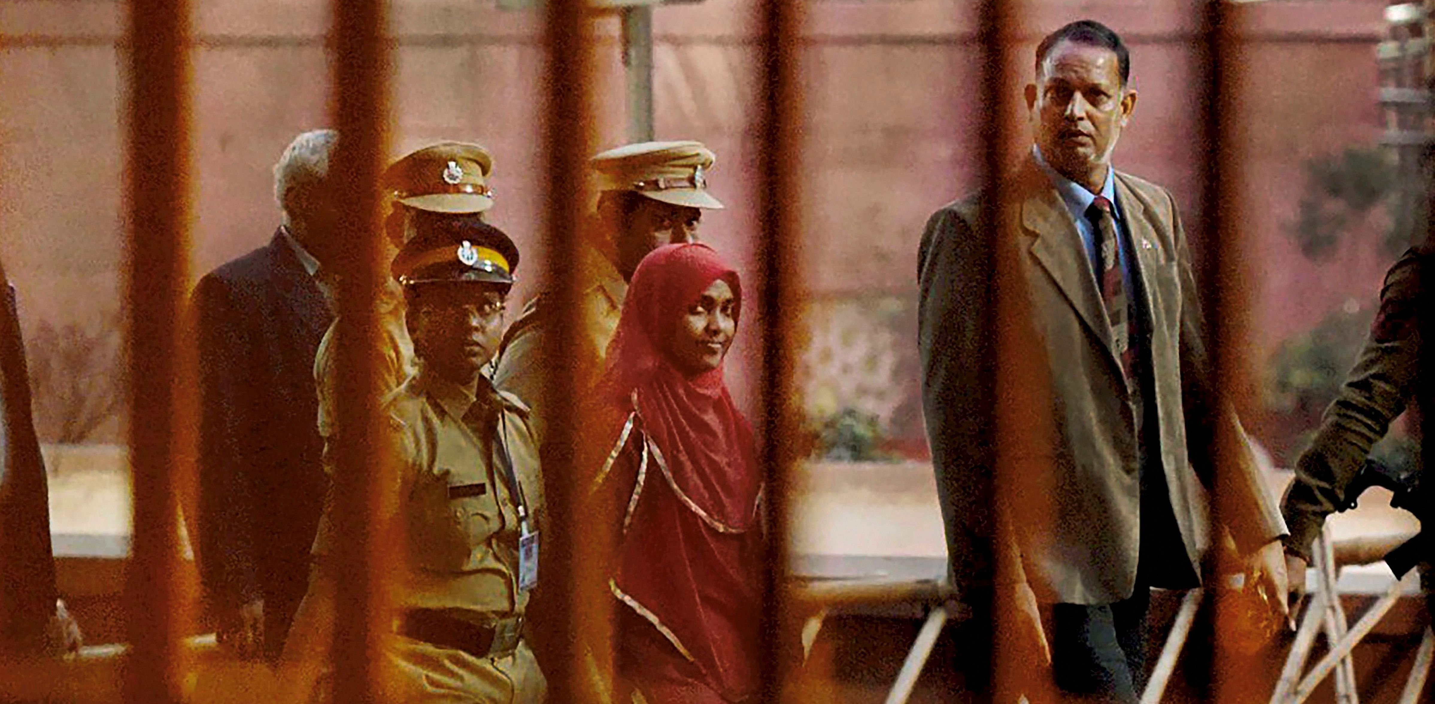 Hadiya, a 24-year-old Hindu woman from Kerala who converted to Islam, leaves the Supreme Court in New Delhi after a hearing in the Kerala 'Love Jihad' case on Monday. Credit: PTI Photo