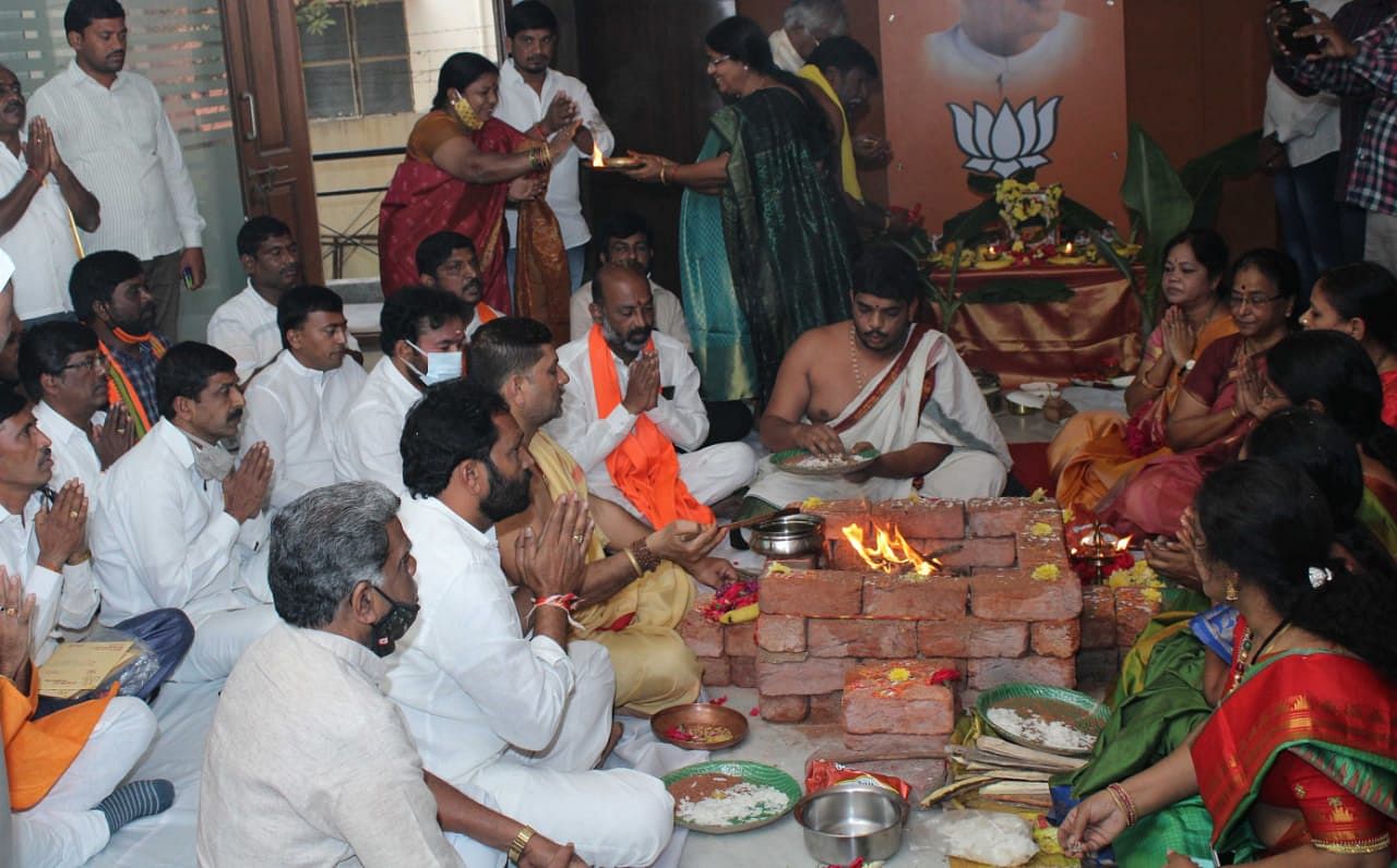 Telangana BJP leaders Bandi Sanjay, Kishan Reddy and others take part in a puja, a day ahead of the GHMC elections. Credit: DH Photo By arrangement