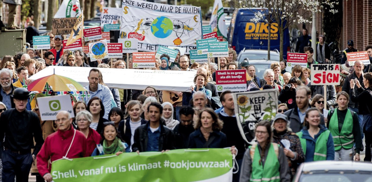 Environmental groups will face off against Shell at a Dutch court on December 1, 2020 in a landmark bid to force the oil giant to meet emissions targets in the Paris climate accord. Credit: AFP Photo
