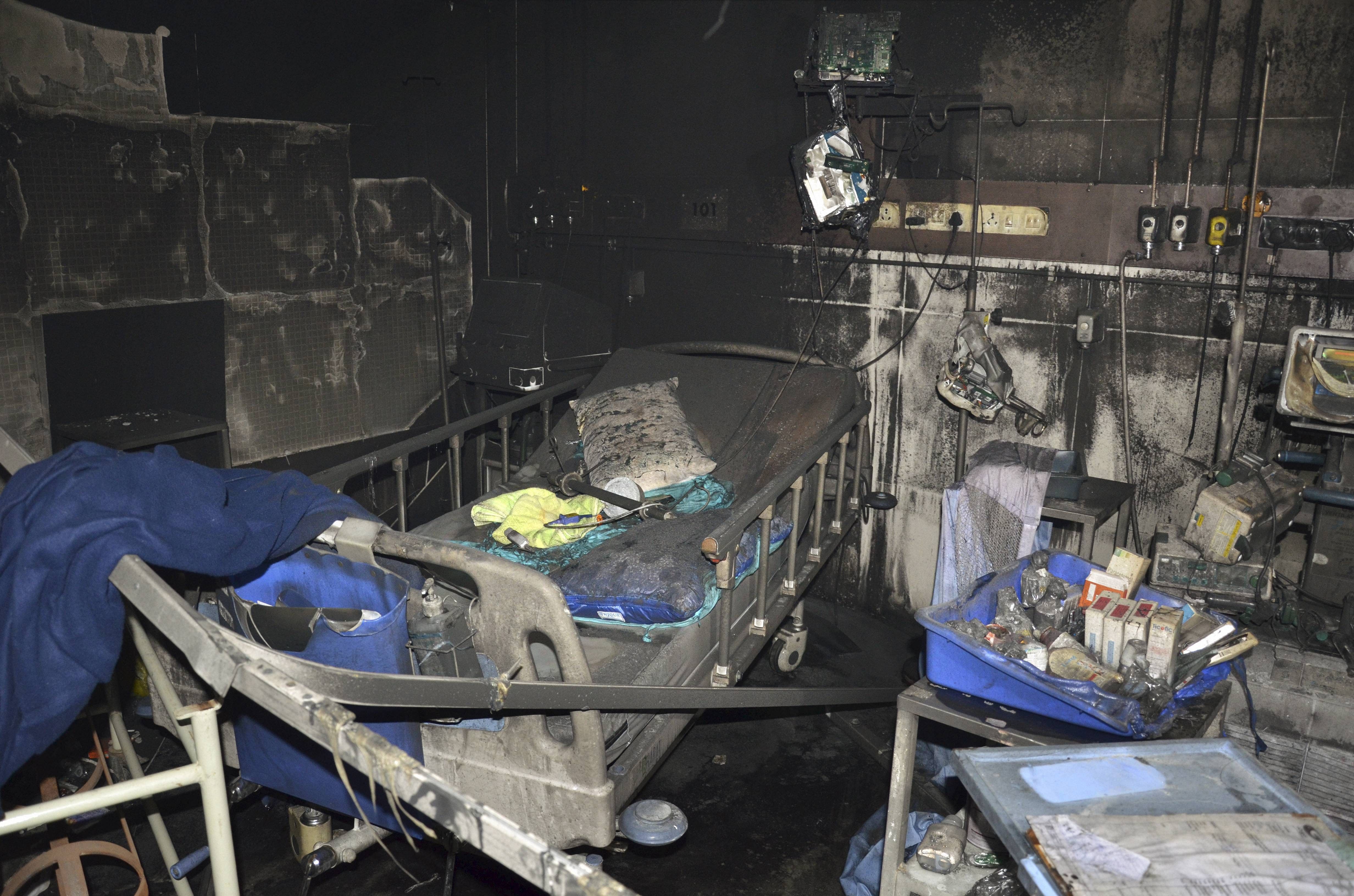 Charred remains inside the ICU of a designated COVID-19 hospital after the fire broke out today, in Rajkot, Friday, Nov. 27, 2020. Five Covid-19 patients died in the incident. Credit: PTI Photo