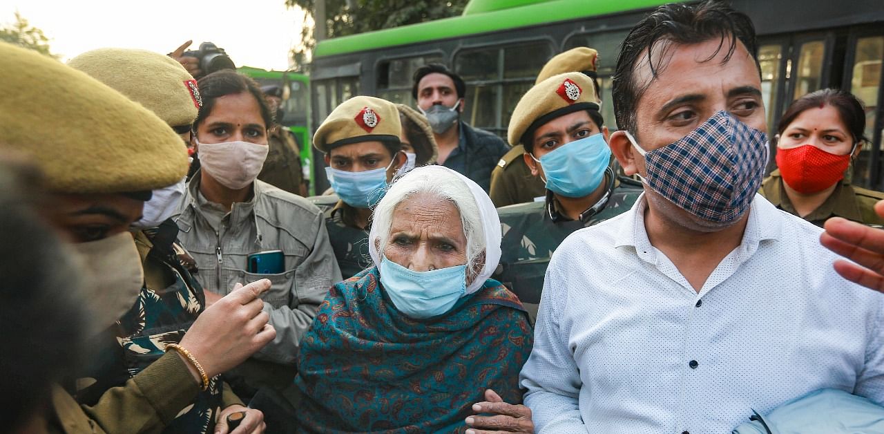 82-year-old Bilkis Bano, popularly known as Shaheen Bagh’s 'Dadi', returns after being denied to join farmers protesting at Singhu border over the Centre's farm reform laws, in New Delhi. Credit: PTI Photo