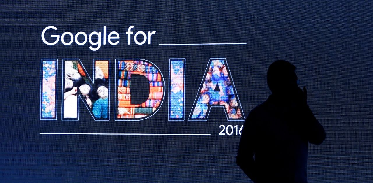 A man stands in front of a screen during a Google event in New Delhi. Credit: Reuters Photo