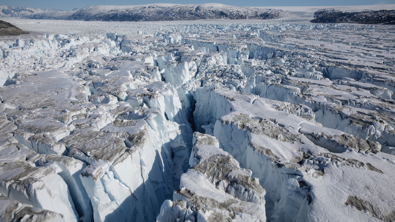 Crevasses form on top of the Helheim glacier near Tasiilaq, Greenland. Credit: Reuters Photo